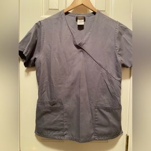 SB Scrub steel gray scrub tunic 3 pockets on front tie back. Size Small.